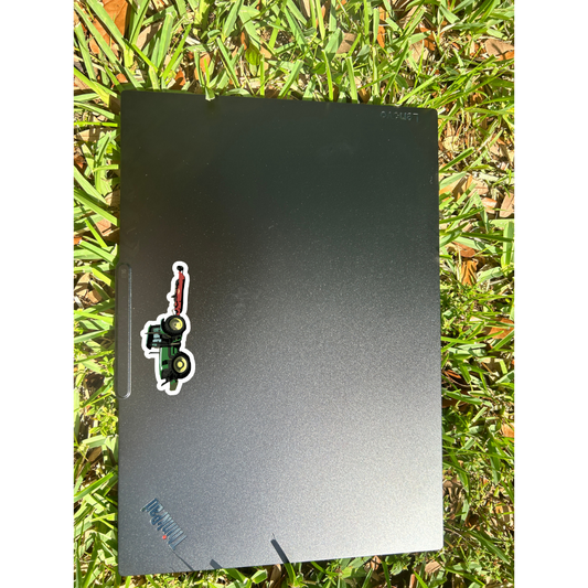Green Tractor with Red Mower Sticker